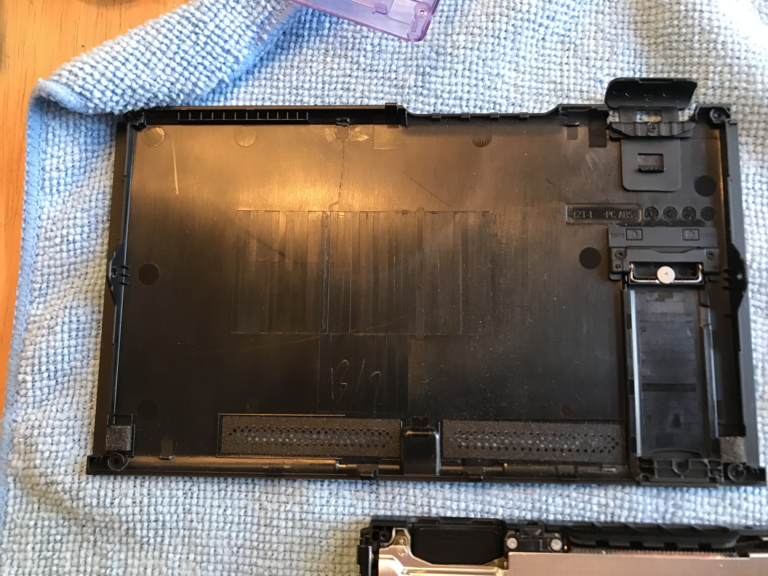 Back panel of the console after being removed.