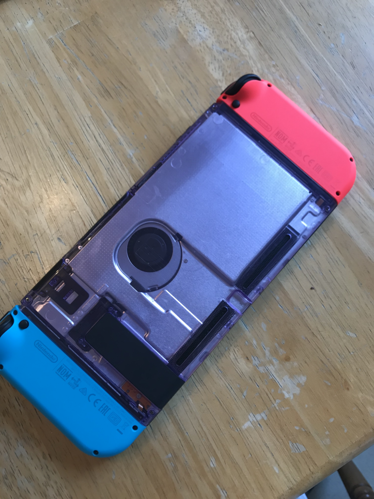 Atomic Purple back panel & the stock Blue & Red Joy-Cons.