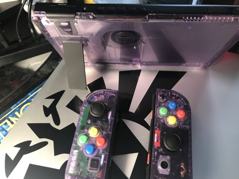 Atomic Purple console & Joy-Con casings.